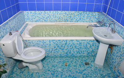 Bathroom overflow tub and sink causing flooding