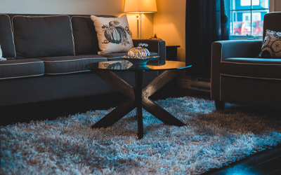 Steam cleaned area rug in a cozy dim lit living room